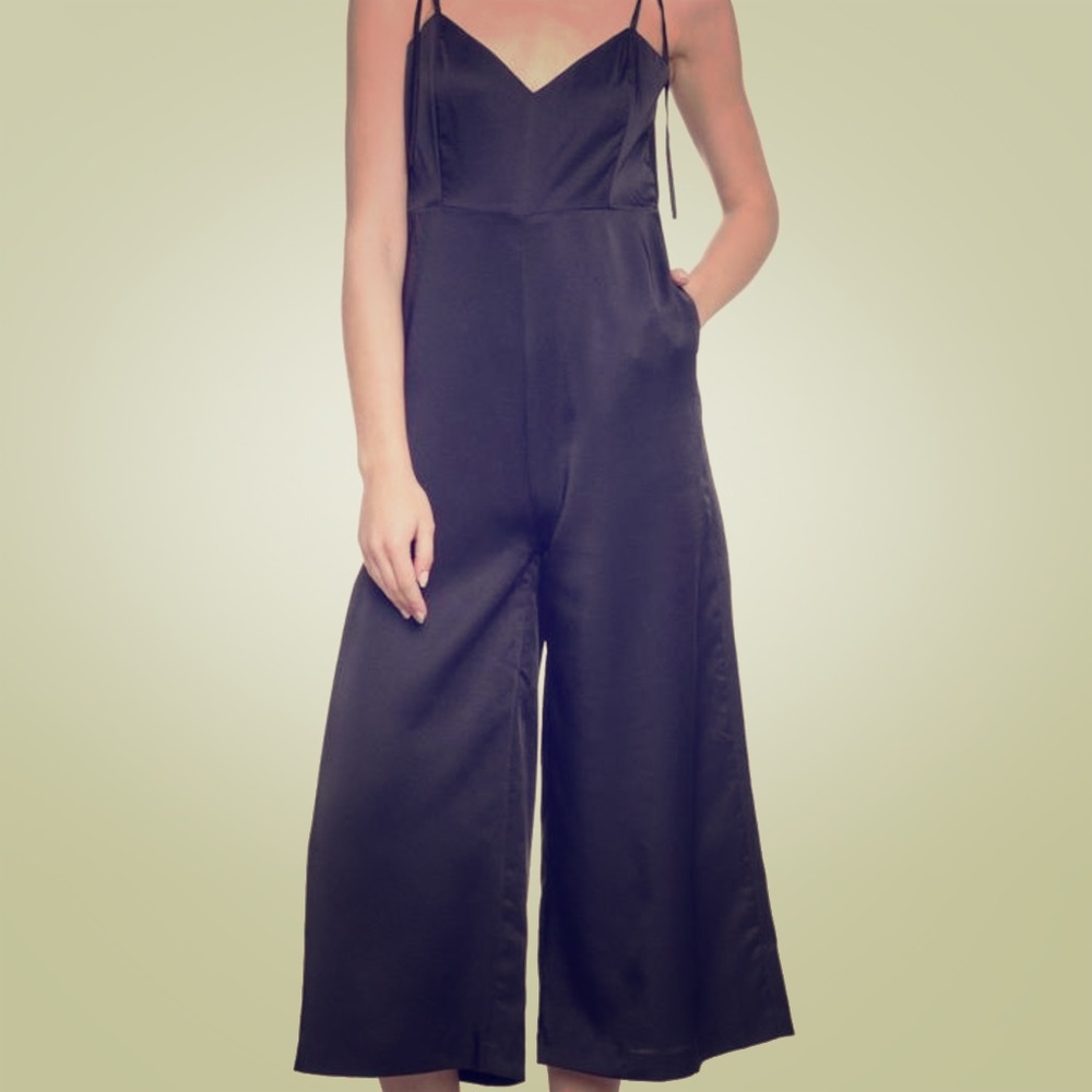 Black satin jumpsuit from English Factory.